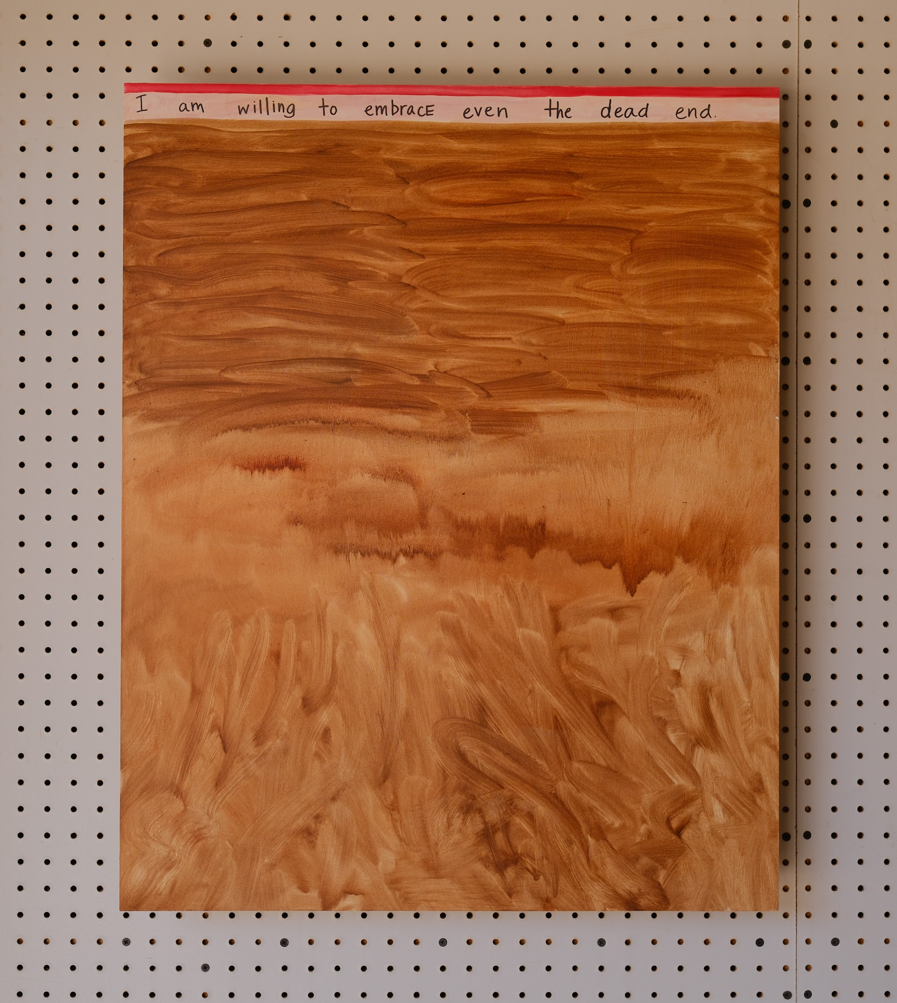 Dance Over Thought: stained field with a handwritten line across the top